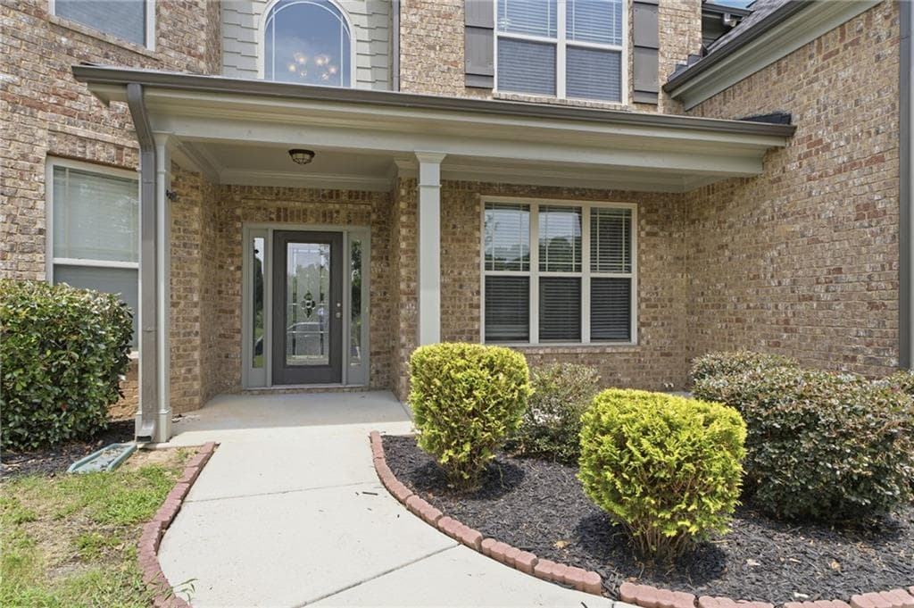 5 bedroom, 4 bathroom, 3,956 sq ft single family residence for sale at 1283 Skipping Stone Court, Dacula, GA 30019 — photo 4