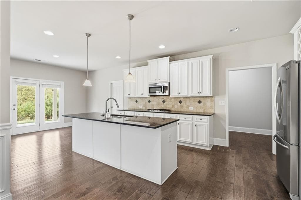 5 bedroom, 4 bathroom, 3,956 sq ft single family residence for sale at 1283 Skipping Stone Court, Dacula, GA 30019 — photo 6