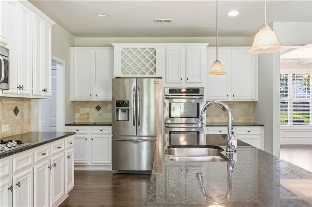 5 bedroom, 4 bathroom, 3,956 sq ft single family residence for sale at 1283 Skipping Stone Court, Dacula, GA 30019 — photo 8