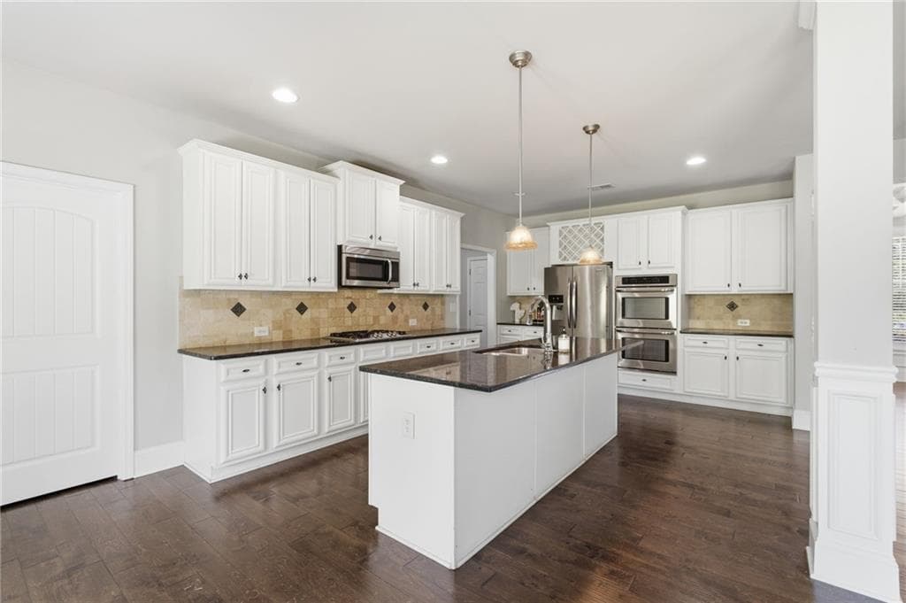 5 bedroom, 4 bathroom, 3,956 sq ft single family residence for sale at 1283 Skipping Stone Court, Dacula, GA 30019 — photo 9