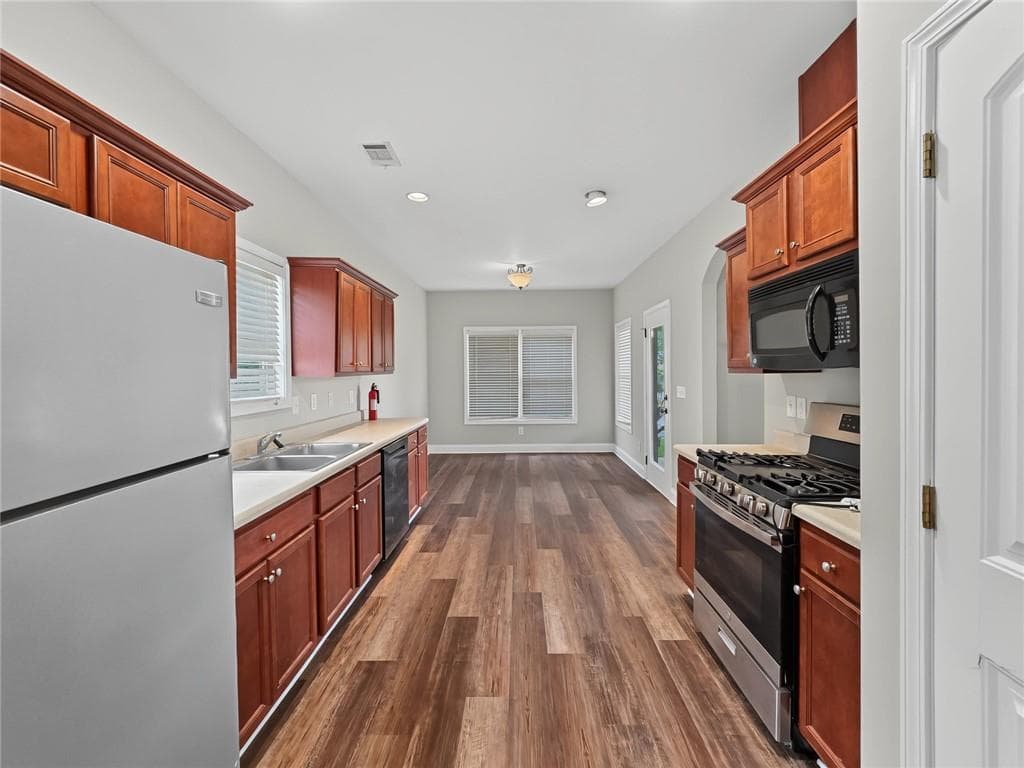 4 bedroom, 3 bathroom, 2,054 sq ft single family residence for sale at 441 Sweet Ashley Way, Loganville, GA 30052 — photo 6