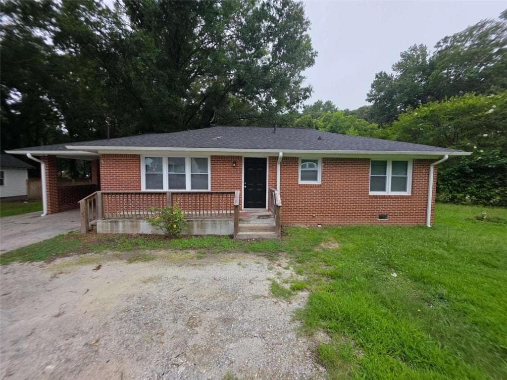 3 bedroom, 2 bathroom, 1,412 sq ft single family residence for sale at 1214 S Broad Street, Monroe, GA 30655 — photo 2
