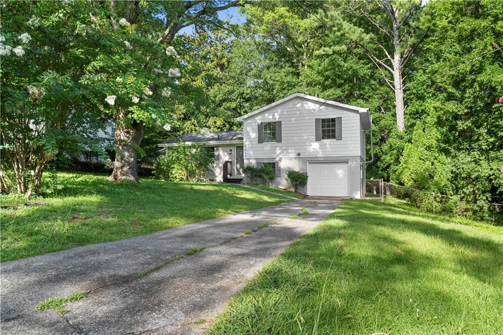 3 bedroom, 2 bathroom, 1,630 sq ft single family residence for sale at 4424 Twin Creek Drive, Kennesaw, GA 30144 — photo 2