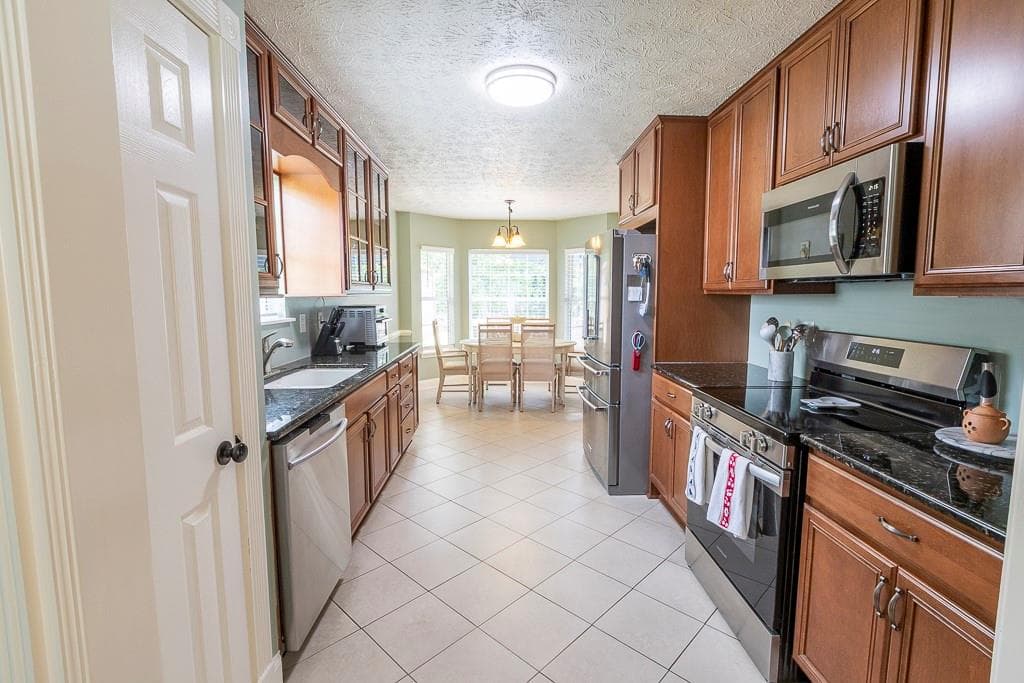 4 bedroom, 3 bathroom, 2,191 sq ft single family residence for sale at 3880 Byrnwycke Drive, Buford, GA 30519 — photo 9