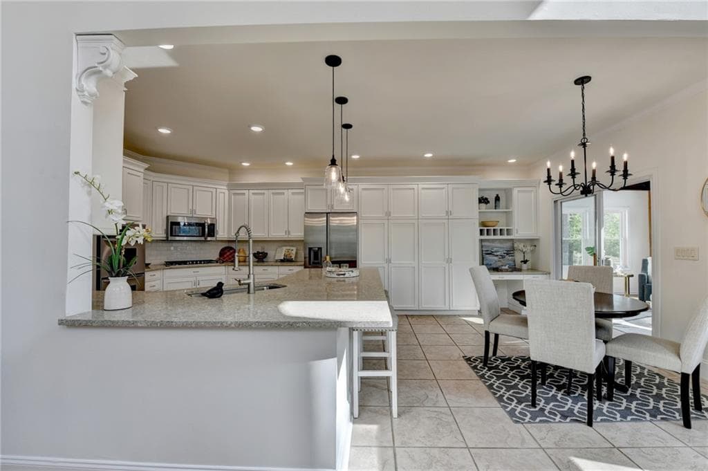 4 bedroom, 5 bathroom, 5,178 sq ft single family residence for sale at 6336 Old Shadburn Ferry Road, Buford, GA 30518 — photo 6