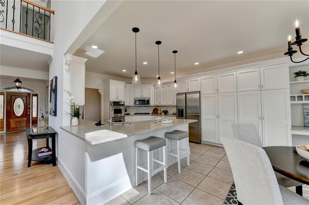 4 bedroom, 5 bathroom, 5,178 sq ft single family residence for sale at 6336 Old Shadburn Ferry Road, Buford, GA 30518 — photo 8