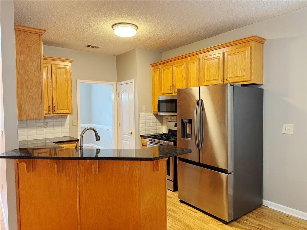 5 bedroom, 4 bathroom, 1,999 sq ft single family residence for sale at 522 Morgan Court, Hampton, GA 30228 — photo 5