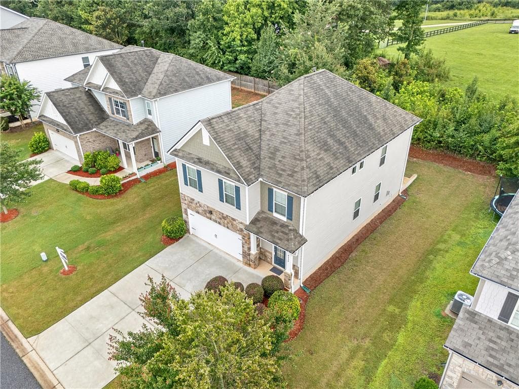5 bedroom, 3 bathroom, 2,368 sq ft single family residence for sale at 4335 Huron Drive, Cumming, GA 30028 — photo 6