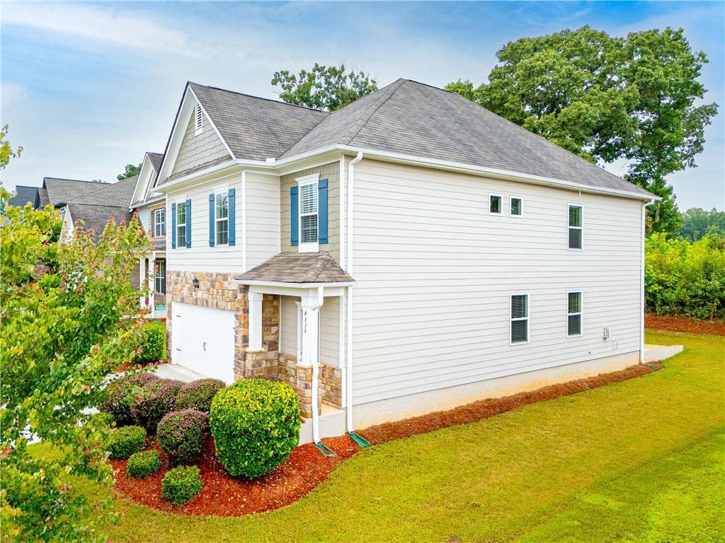 5 bedroom, 3 bathroom, 2,368 sq ft single family residence for sale at 4335 Huron Drive, Cumming, GA 30028 — photo 7