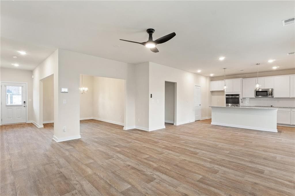 4 bedroom, 3 bathroom, 2,700 sq ft single family residence for sale at 719 CONEFLOWER Way, Mcdonough, GA 30253 — photo 4