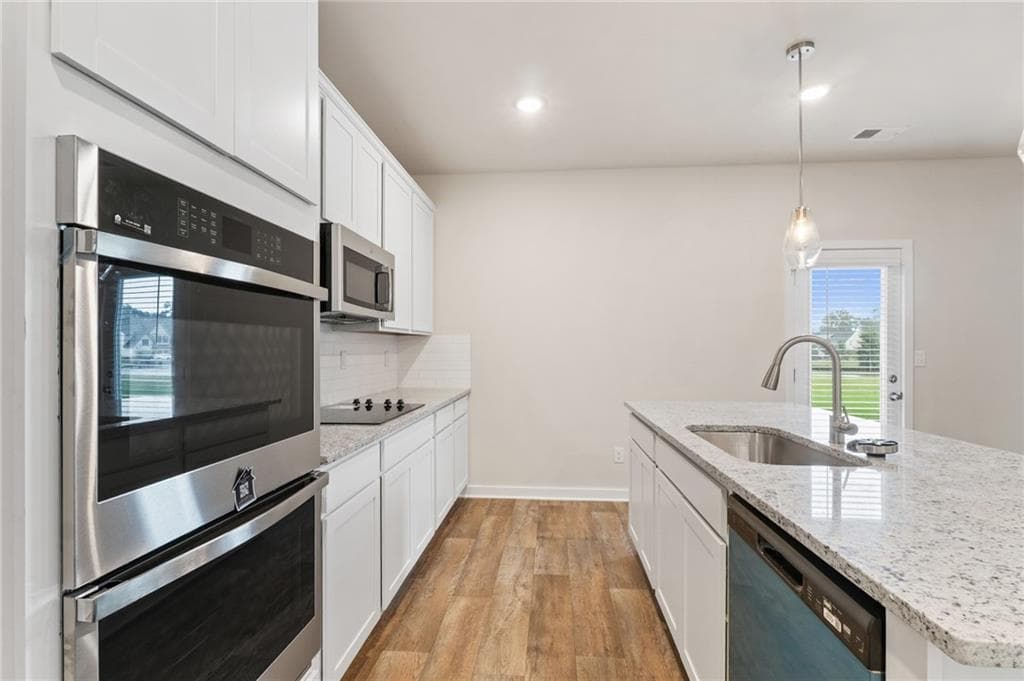 4 bedroom, 3 bathroom, 2,700 sq ft single family residence for sale at 719 CONEFLOWER Way, Mcdonough, GA 30253 — photo 8