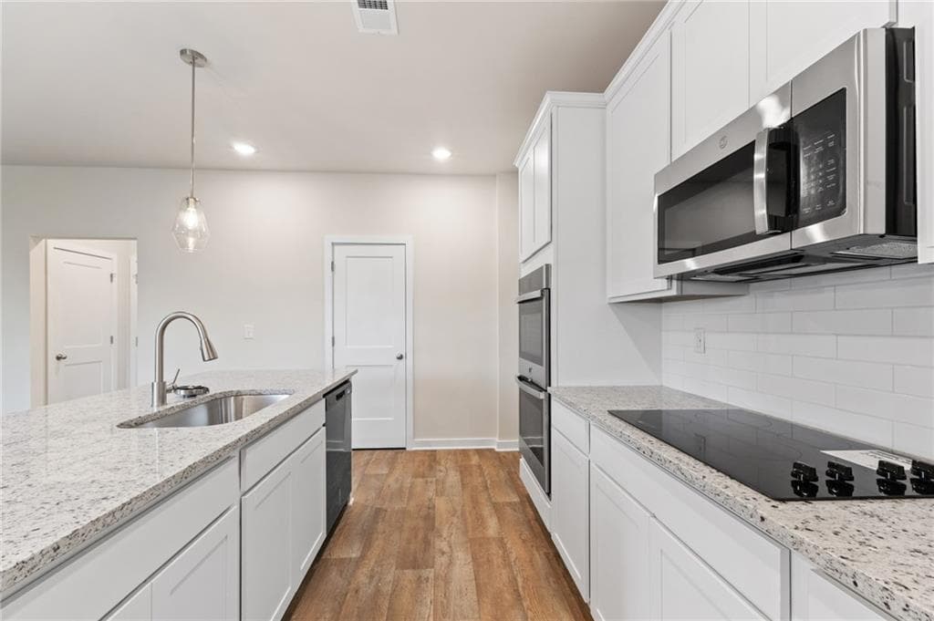 4 bedroom, 3 bathroom, 2,700 sq ft single family residence for sale at 719 CONEFLOWER Way, Mcdonough, GA 30253 — photo 9