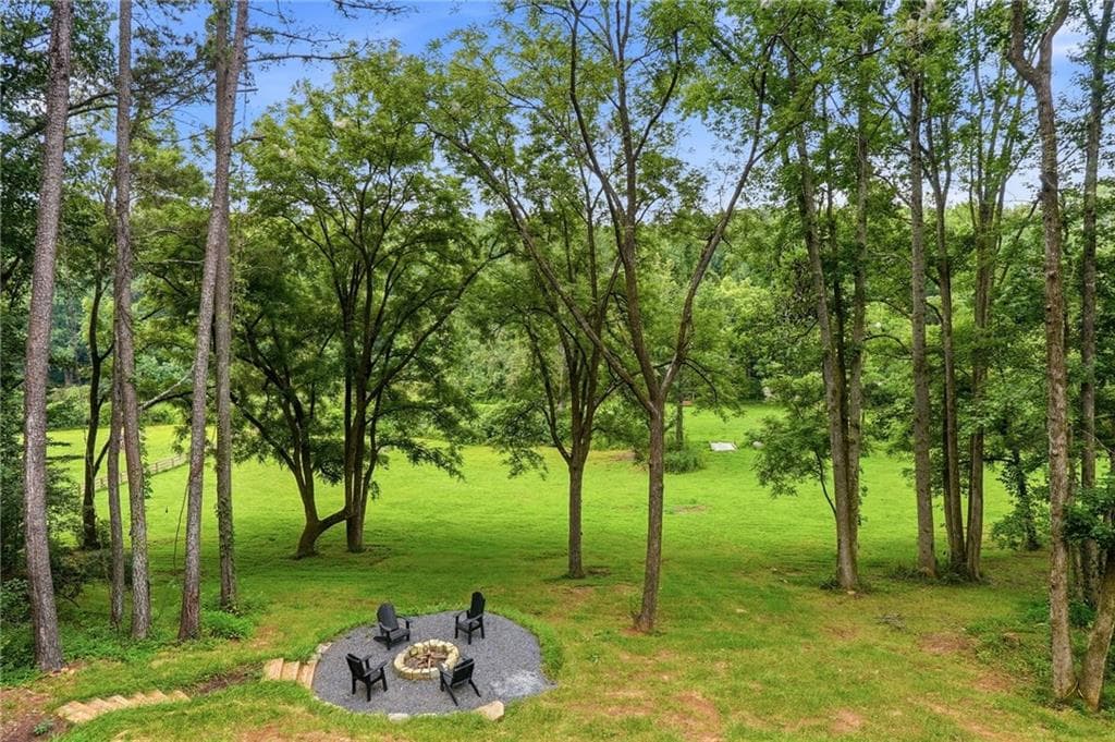 4 bedroom, 5 bathroom, 4,112 sq ft single family residence for sale at 1783 4 Mile Church Rd, Ball Ground, GA 30107 — photo 7