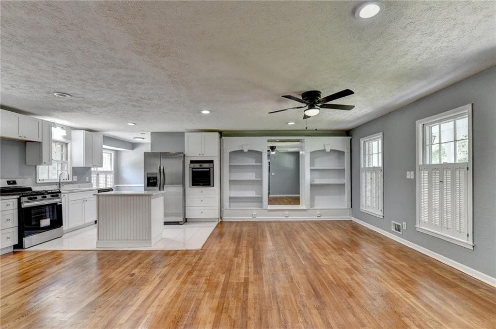 4 bedroom, 3 bathroom, 2,650 sq ft single family residence for sale at 4875 Five Forks Trickum Road, Lilburn, GA 30047 — photo 5