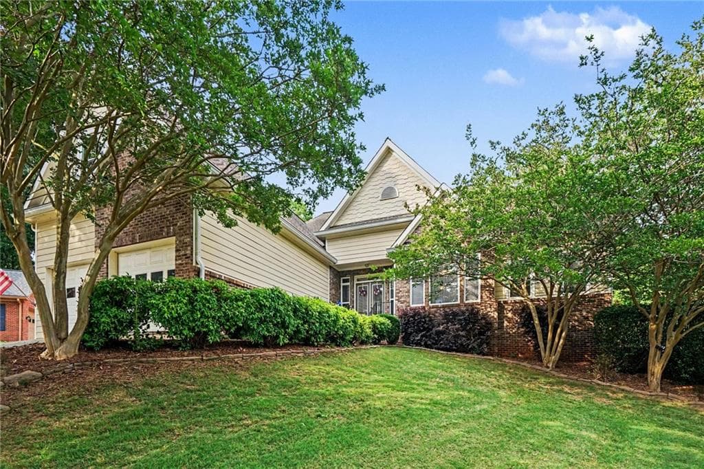 6 bedroom, 4 bathroom, 4,000 sq ft single family residence for sale at 7780 Leeward Cove Court, Cumming, GA 30041