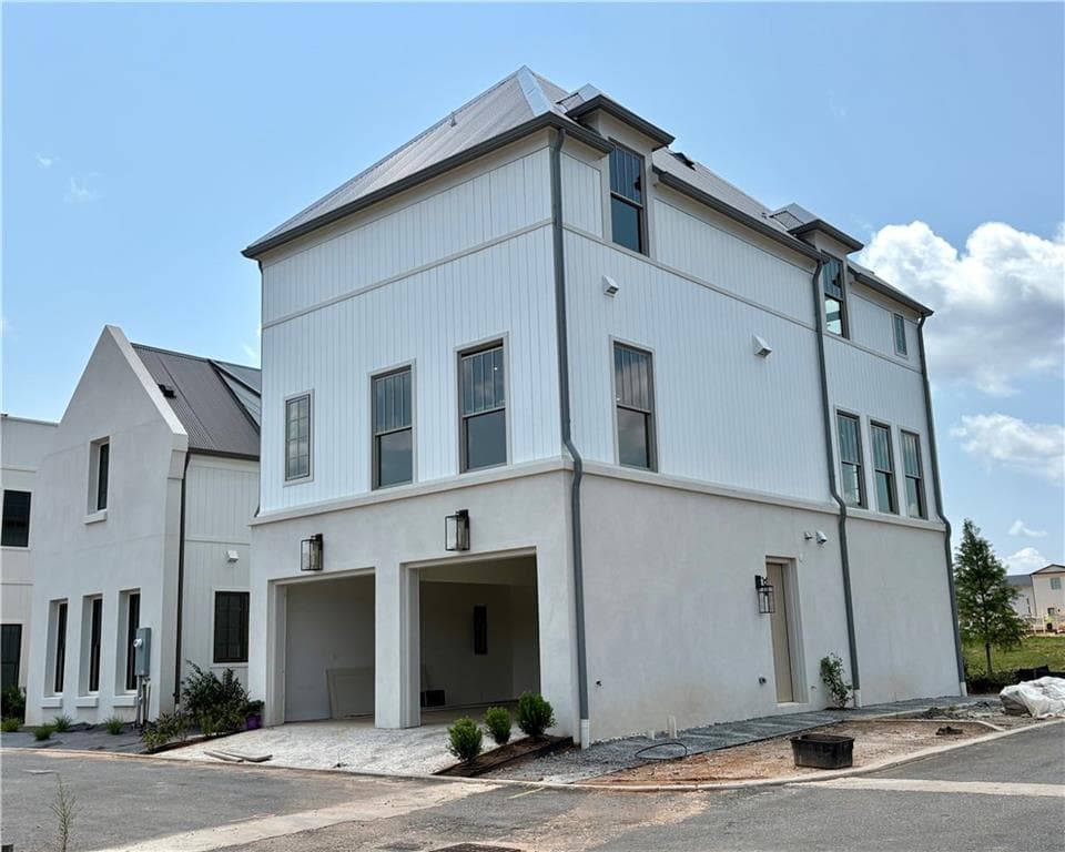 4 bedroom, 4 bathroom, 2,613 sq ft single family residence for sale at 310 Central Avenue, Fayetteville, GA 30214 — photo 2