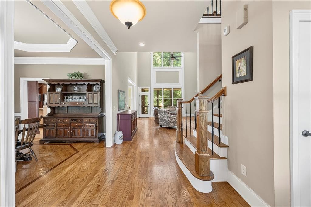 4 bedroom, 5 bathroom, 6,048 sq ft single family residence for sale at 8555 Berringer Point Drive, Gainesville, GA 30506 — photo 7