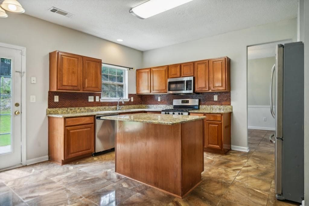 4 bedroom, 3 bathroom, 2,458 sq ft single family residence for rent at 2455 Beckenham Place, Dacula, GA 30019 for $2,699 a month — photo 5
