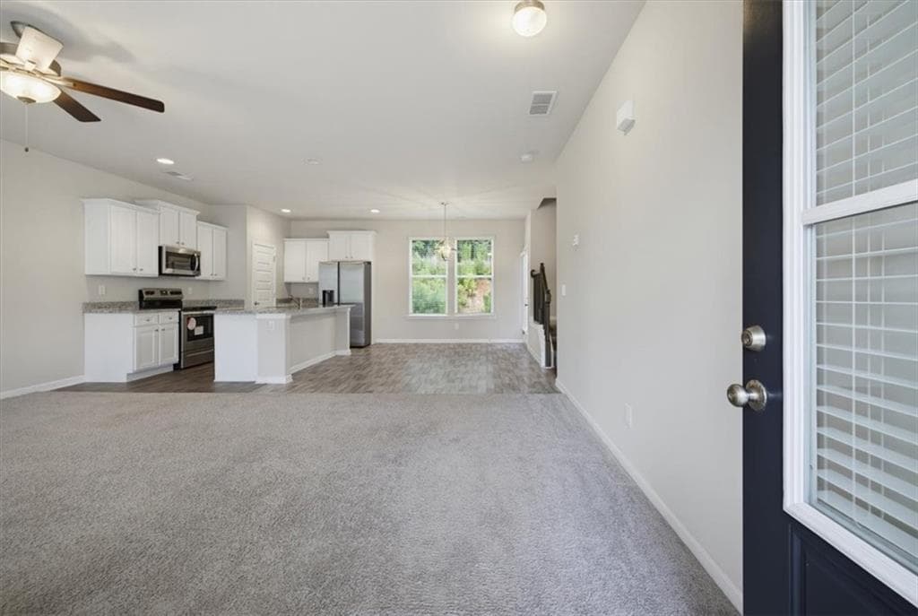 4 bedroom, 3 bathroom, 1,860 sq ft single family residence for sale at 677 Ragan Court, Social Circle, GA 30025 — photo 5