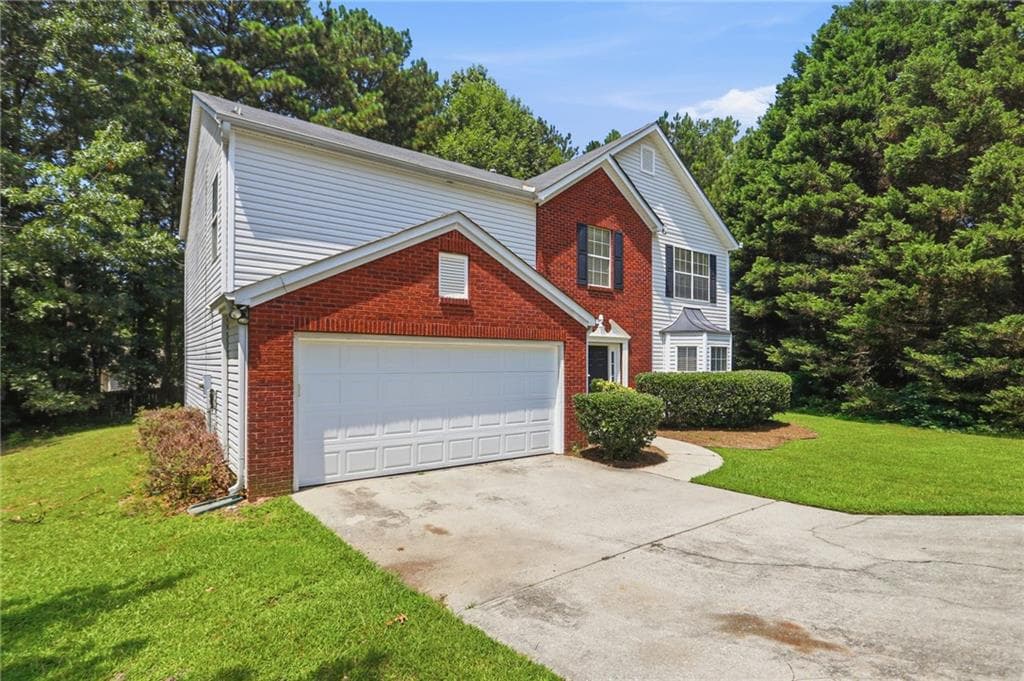 5 bedroom, 3 bathroom, 2,396 sq ft single family residence for sale at 3925 Bradford Walk Trail, Buford, GA 30519 — photo 2