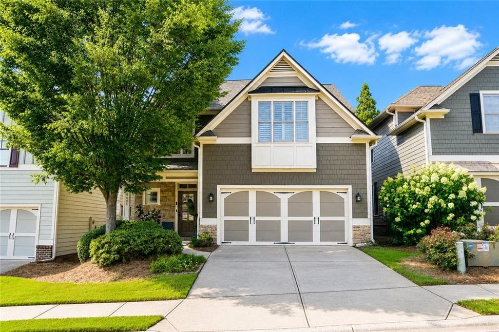 4 bedroom, 4 bathroom, 2,601 sq ft single family residence for sale at 8445 Village School Drive, Cumming, GA 30041 — photo 1 of 57