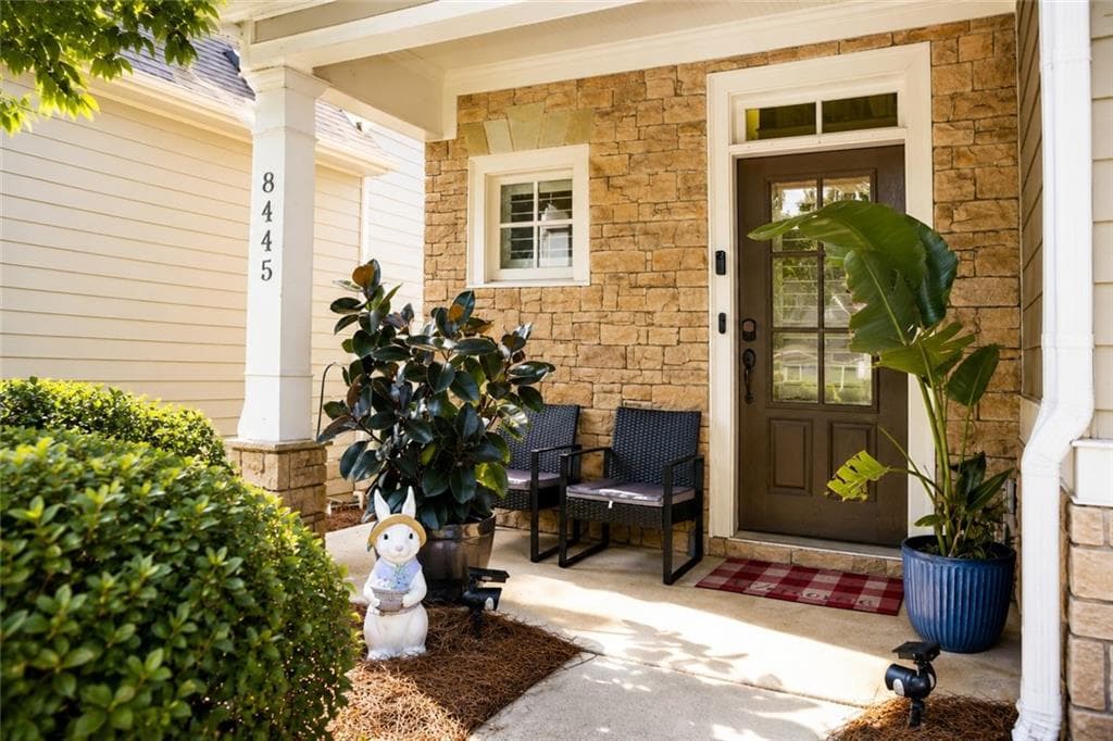 4 bedroom, 4 bathroom, 2,601 sq ft single family residence for sale at 8445 Village School Drive, Cumming, GA 30041 — photo 2