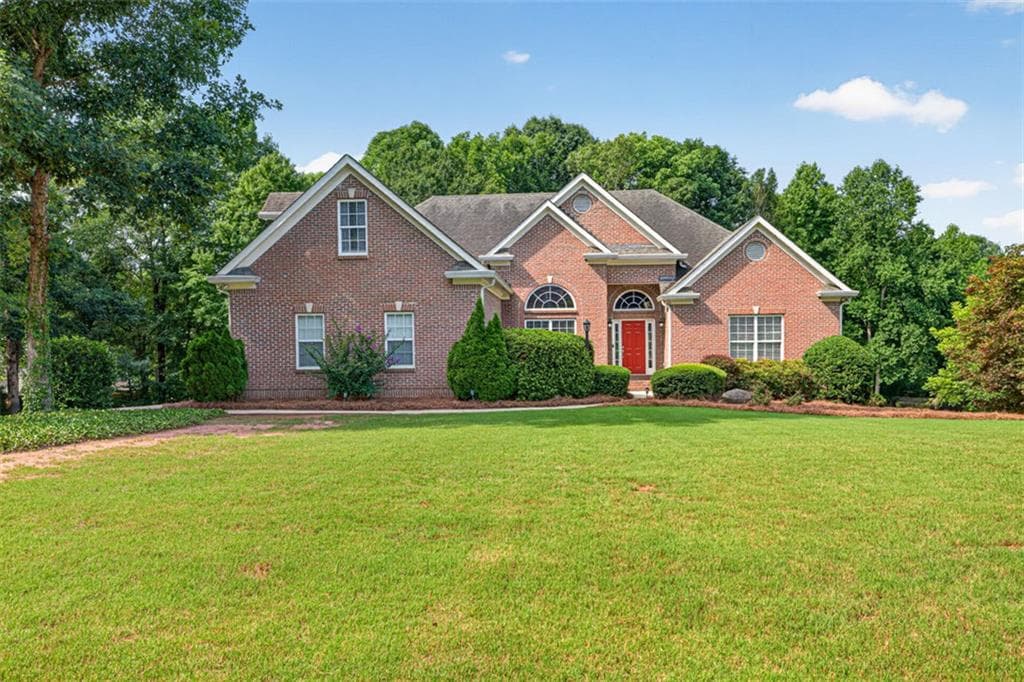 4 bedroom, 3 bathroom, 3,875 sq ft single family residence for sale at 1403 Lull Water Court, Hoschton, GA 30548 — photo 1 of 46