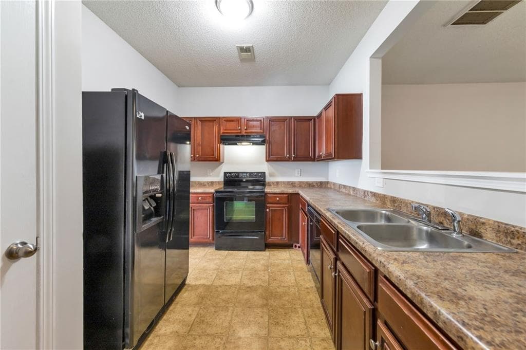 3 bedroom, 3 bathroom, 1,544 sq ft townhouse for rent at 2306 Bigwood Trail, Atlanta, GA 30349 for $1,645 a month — photo 3
