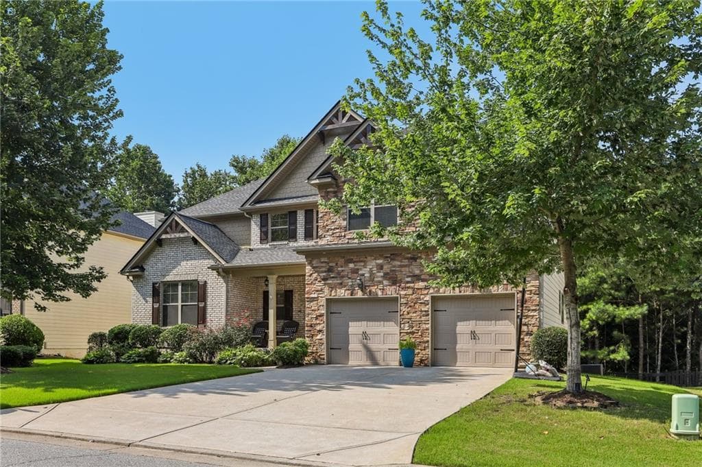 5 bedroom, 6 bathroom, 4,008 sq ft single family residence for sale at 5340 Winding Lakes Drive, Cumming, GA 30028 — photo 3
