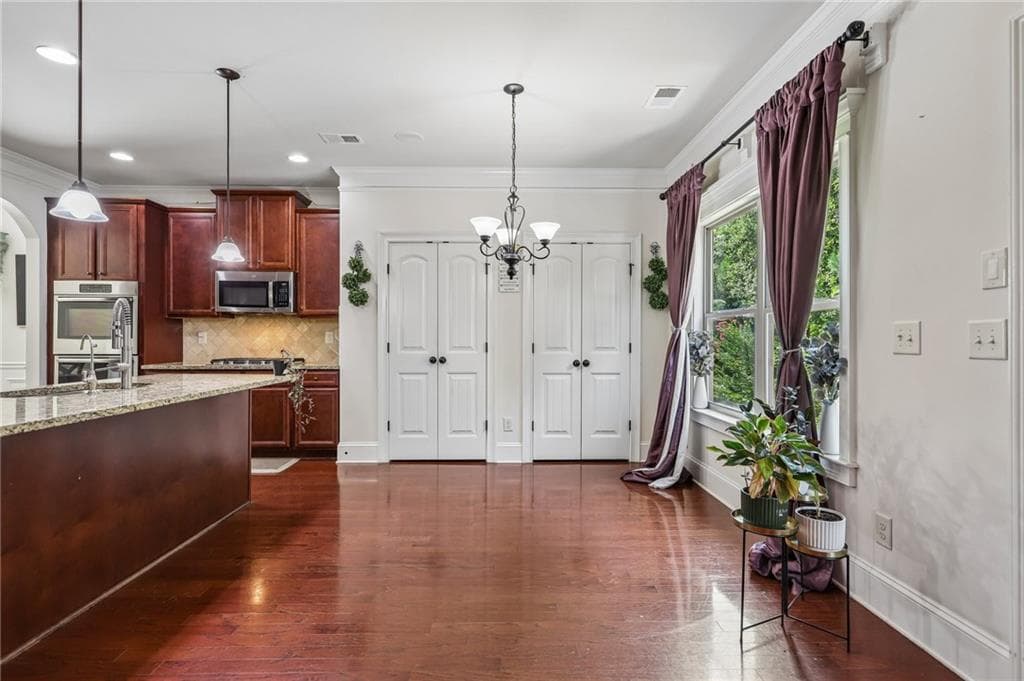 5 bedroom, 6 bathroom, 4,008 sq ft single family residence for sale at 5340 Winding Lakes Drive, Cumming, GA 30028 — photo 10