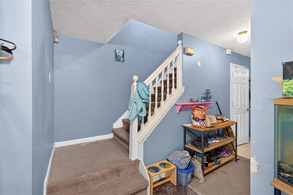 4 bedroom, 3 bathroom, 2,226 sq ft single family residence for sale at 2345 Rocky Waters Trail, Buford, GA 30519 — photo 3