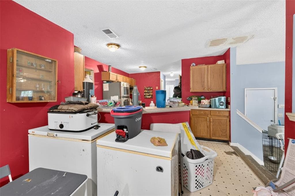 4 bedroom, 3 bathroom, 2,226 sq ft single family residence for sale at 2345 Rocky Waters Trail, Buford, GA 30519 — photo 8