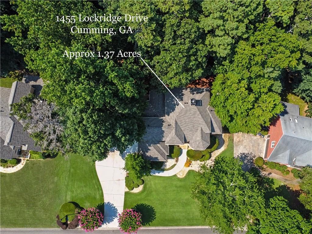6 bedroom, 5 bathroom, 5,063 sq ft single family residence for sale at 1455 Lockridge Drive, Cumming, GA 30041 — photo 5
