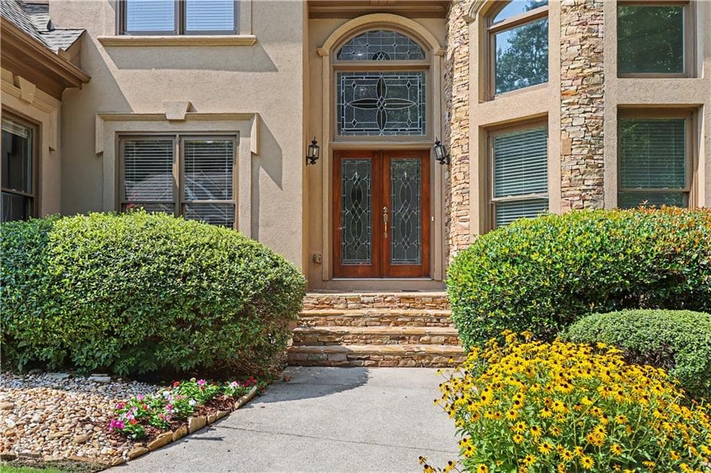6 bedroom, 5 bathroom, 5,063 sq ft single family residence for sale at 1455 Lockridge Drive, Cumming, GA 30041 — photo 6
