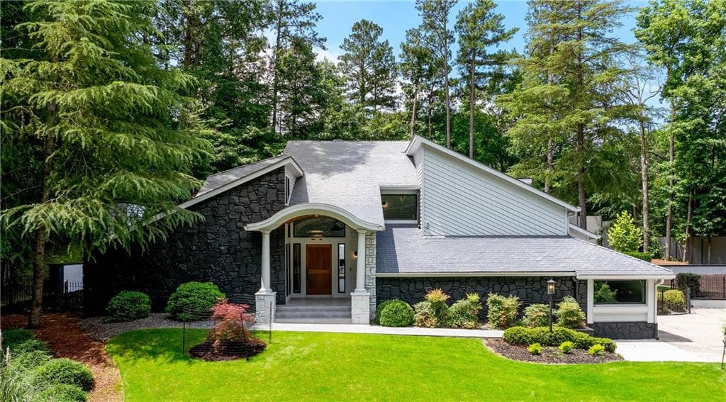 5 bedroom, 4 bathroom, 3,790 sq ft single family residence for sale at 4070 Whitewater Creek Road, Atlanta, GA 30327 — photo 1 of 40