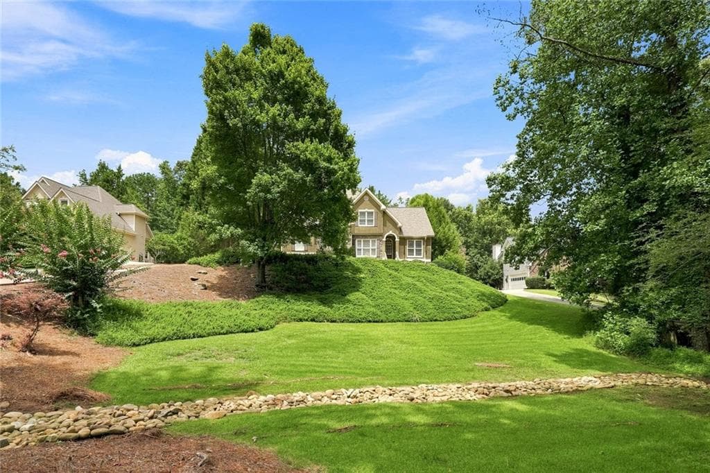4 bedroom, 3 bathroom, 4,225 sq ft single family residence for sale at 2045 Southers Circle, Suwanee, GA 30024 — photo 3