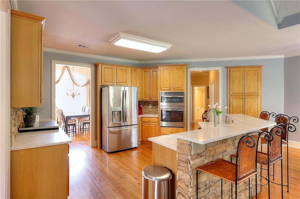 5 bedroom, 5 bathroom, 5,641 sq ft single family residence for sale at 3089 Brombley Drive, Conyers, GA 30013 — photo 4