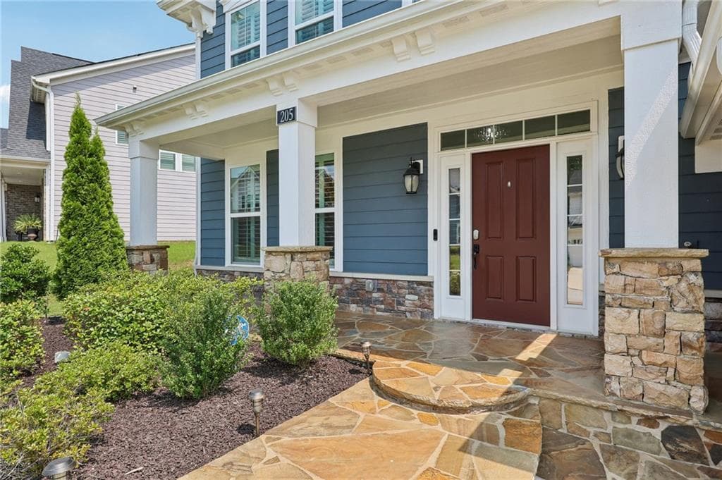 5 bedroom, 4 bathroom, 3,280 sq ft single family residence for sale at 205 Michigan Circle, Hoschton, GA 30548 — photo 2