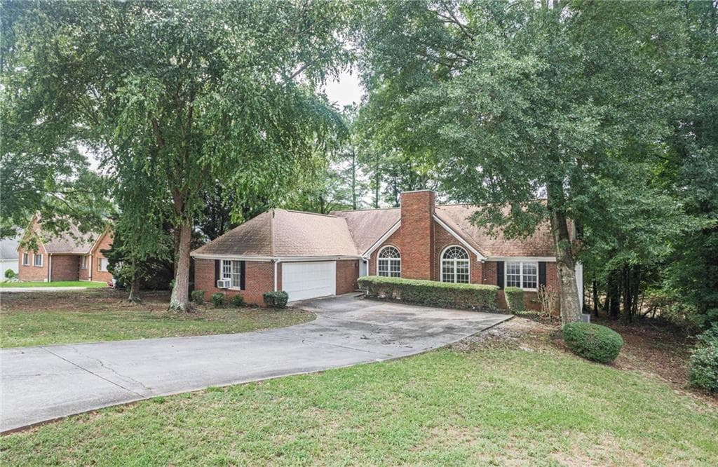 4 bedroom, 2 bathroom, 2,066 sq ft single family residence for sale at 1404 Glenfield Drive, Lawrenceville, GA 30043 — photo 5