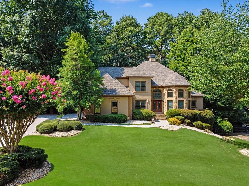 6 bedroom, 5 bathroom, 5,063 sq ft single family residence for sale at 1455 Lockridge Drive, Cumming, GA 30041