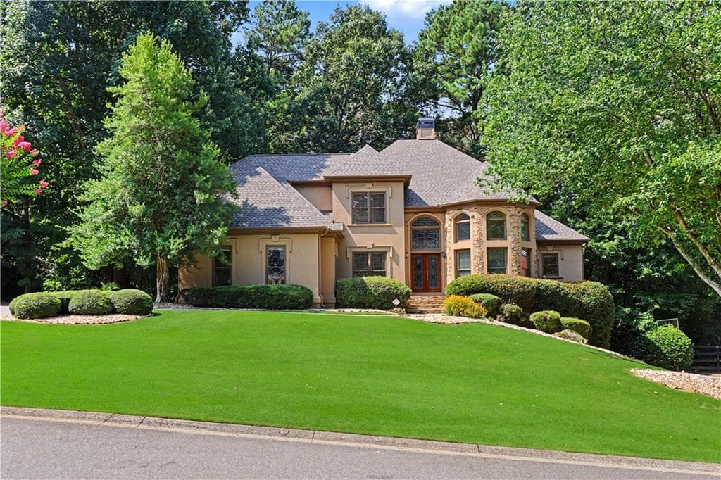 6 bedroom, 5 bathroom, 5,063 sq ft single family residence for sale at 1455 Lockridge Drive, Cumming, GA 30041 — photo 2