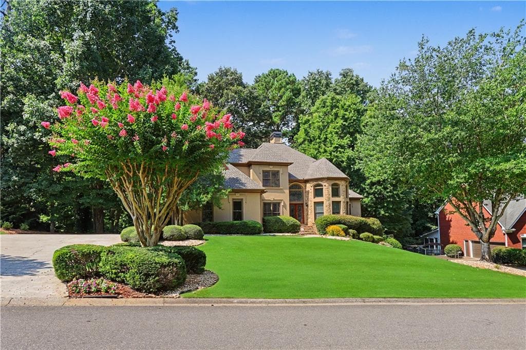 6 bedroom, 5 bathroom, 5,063 sq ft single family residence for sale at 1455 Lockridge Drive, Cumming, GA 30041 — photo 3