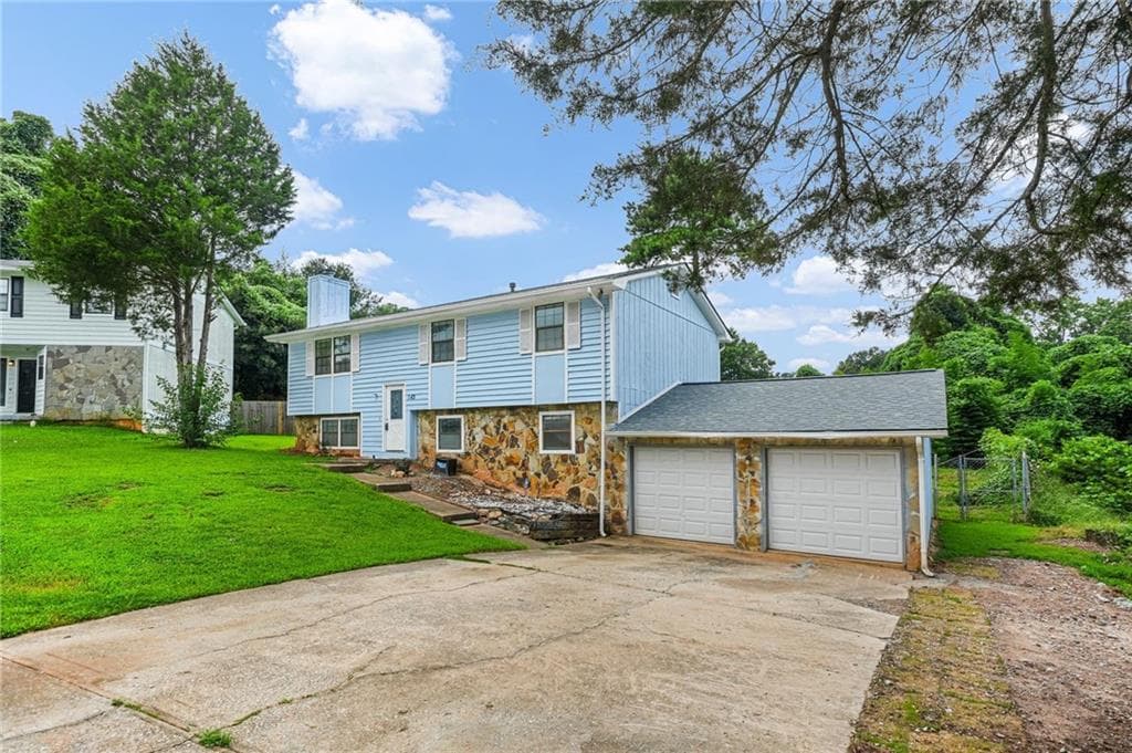 4 bedroom, 3 bathroom, 1,790 sq ft single family residence for sale at 1163 To Lani Farm Road, Stone Mountain, GA 30083 — photo 4