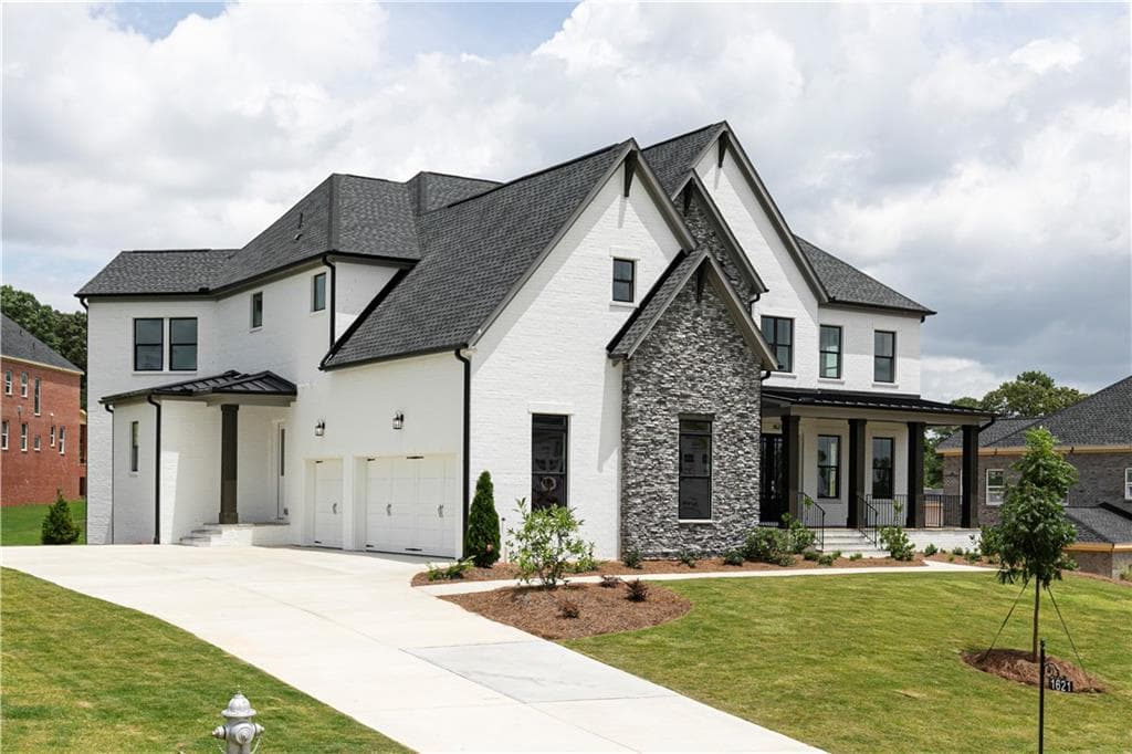 5 bedroom, 6 bathroom, 4,743 sq ft single family residence for sale at 1621 Ledgestone Way, Lawrenceville, GA 30043 — photo 2