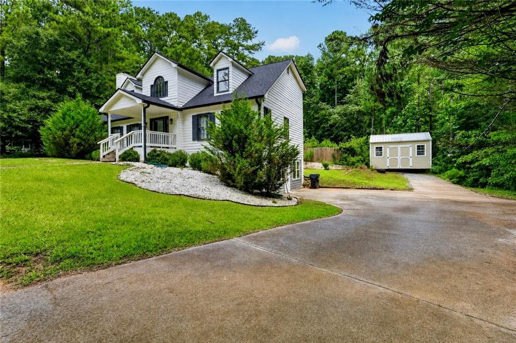 6 bedroom, 5 bathroom, 4,260 sq ft single family residence for sale at 2672 Beecher Drive, Austell, GA 30106 — photo 2
