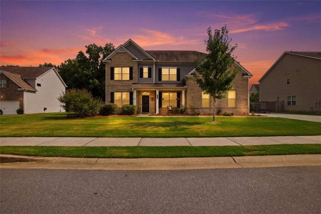 4 bedroom, 3 bathroom, 3,220 sq ft single family residence for sale at 7420 Ansley Park Way, Cumming, GA 30028 — photo 2