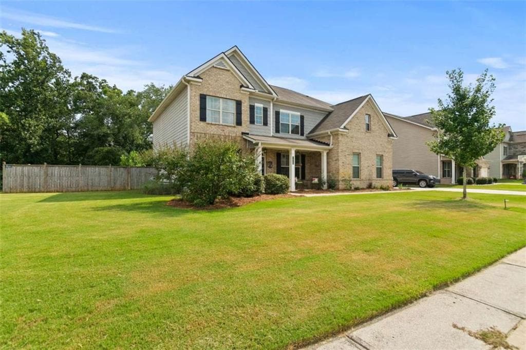 4 bedroom, 3 bathroom, 3,220 sq ft single family residence for sale at 7420 Ansley Park Way, Cumming, GA 30028 — photo 3