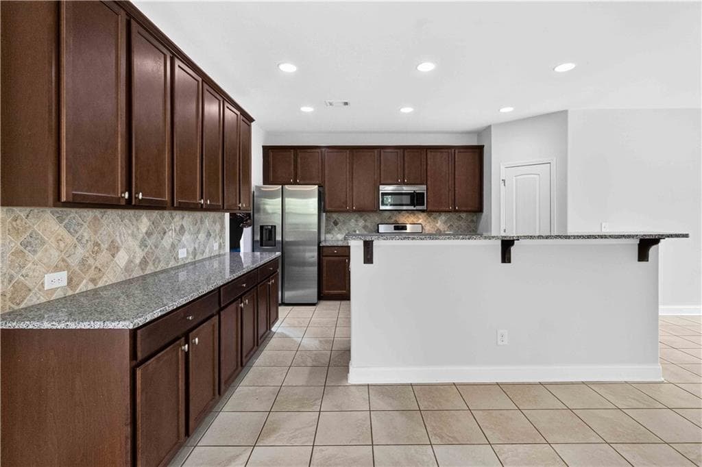 5 bedroom, 4 bathroom, 3,288 sq ft single family residence for sale at 2567 Restoration Drive, Powder Springs, GA 30127 — photo 9