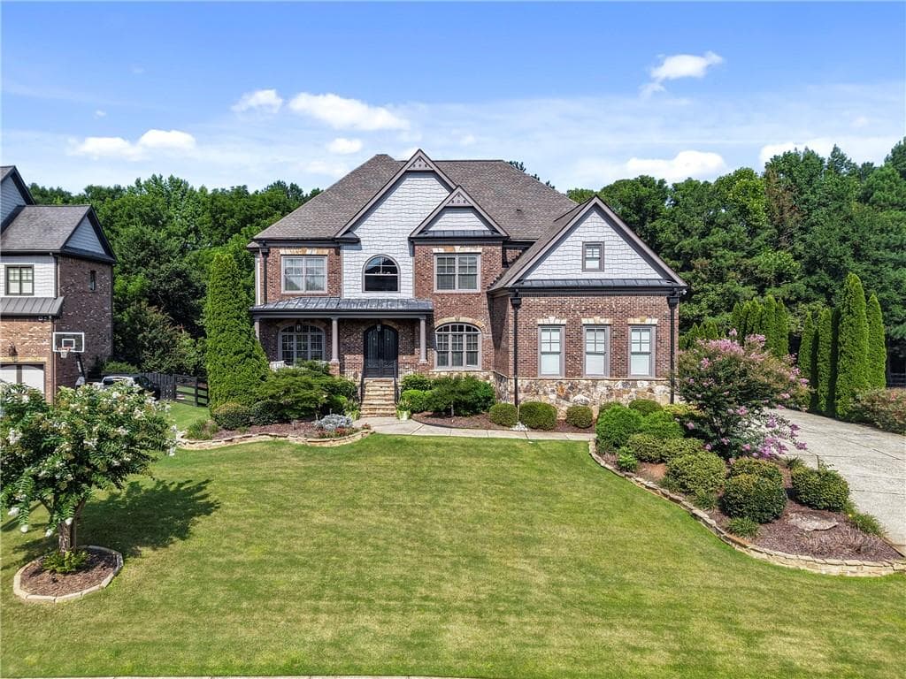 7 bedroom, 6 bathroom, 6,125 sq ft single family residence sold at 230 Millstone Parkway, Woodstock, GA 30188