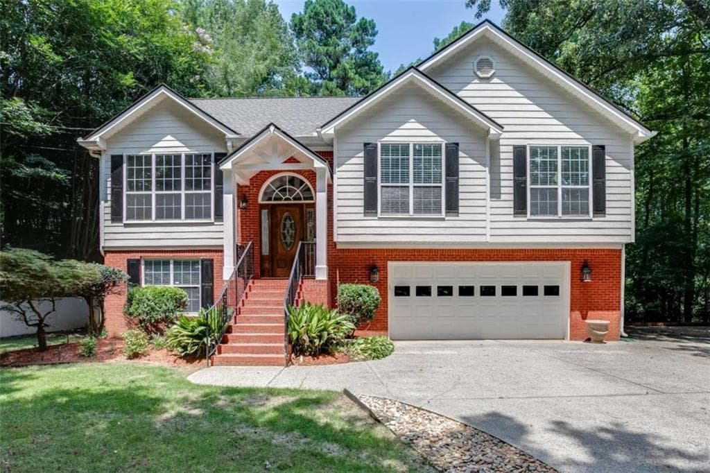 5 bedroom, 3 bathroom, 2,523 sq ft single family residence for sale at 1105 TAB ROBERTS Road, Lawrenceville, GA 30043 — photo 1 of 46